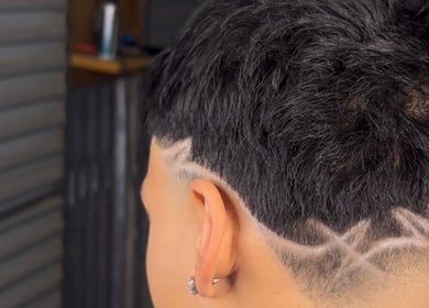 Intricate hair design on a short haircut at k.cutzz1, Springwood, Queensland, AU.