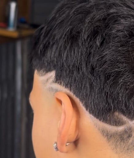 Intricate hair design on a short haircut at k.cutzz1, Springwood, Queensland, AU.