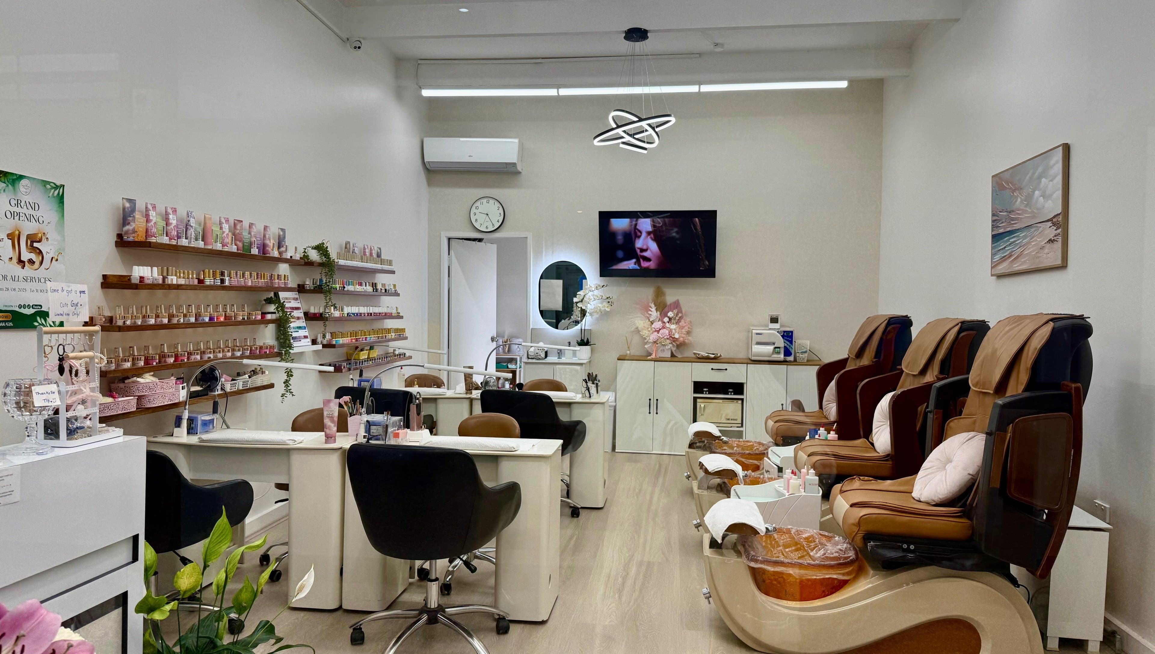 Interior of Engadine Beauty and Nails in Engadine, New South Wales, AU with manicure stations and pedicure chairs.