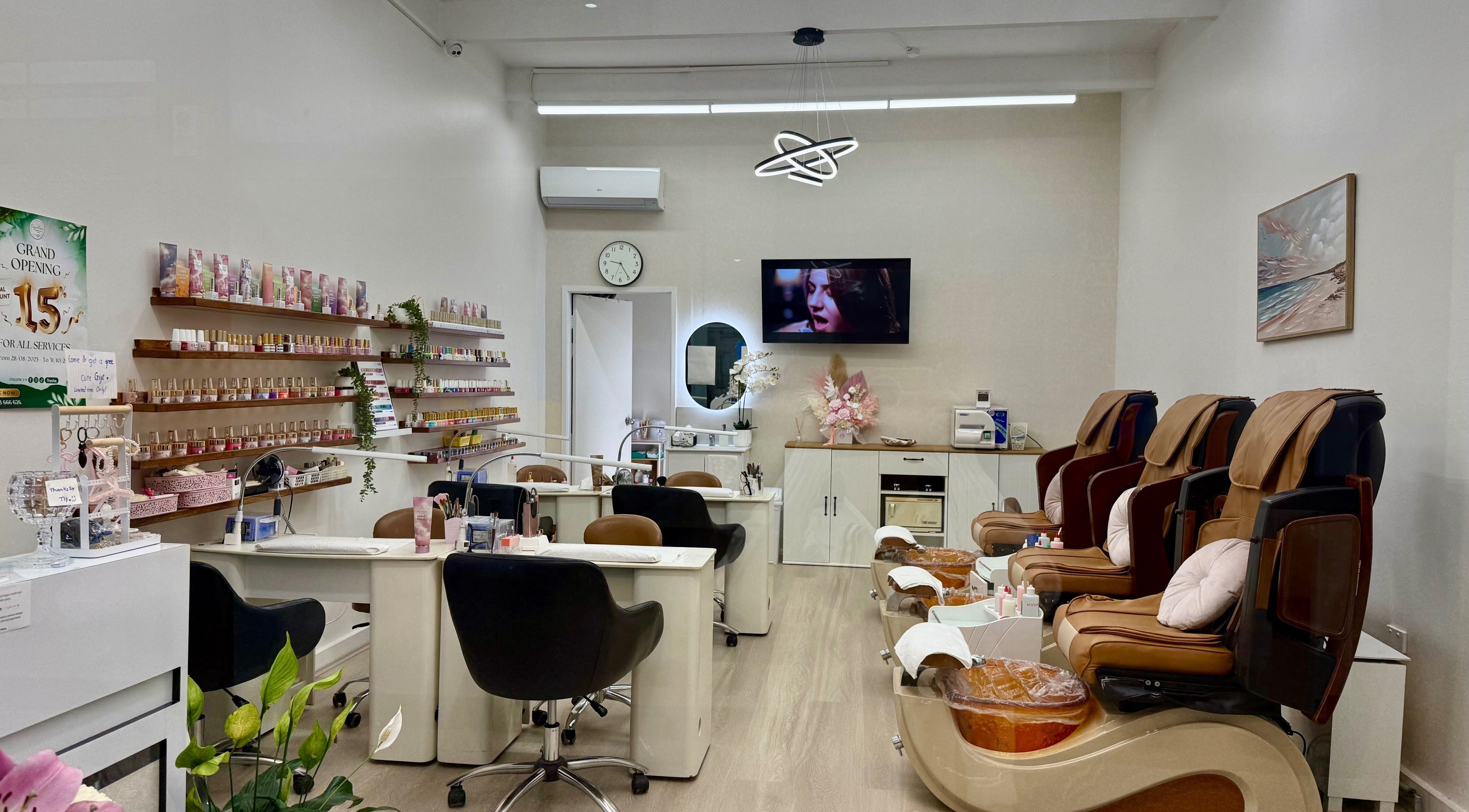 Interior of Engadine Beauty and Nails in Engadine, New South Wales, AU with manicure stations and pedicure chairs.