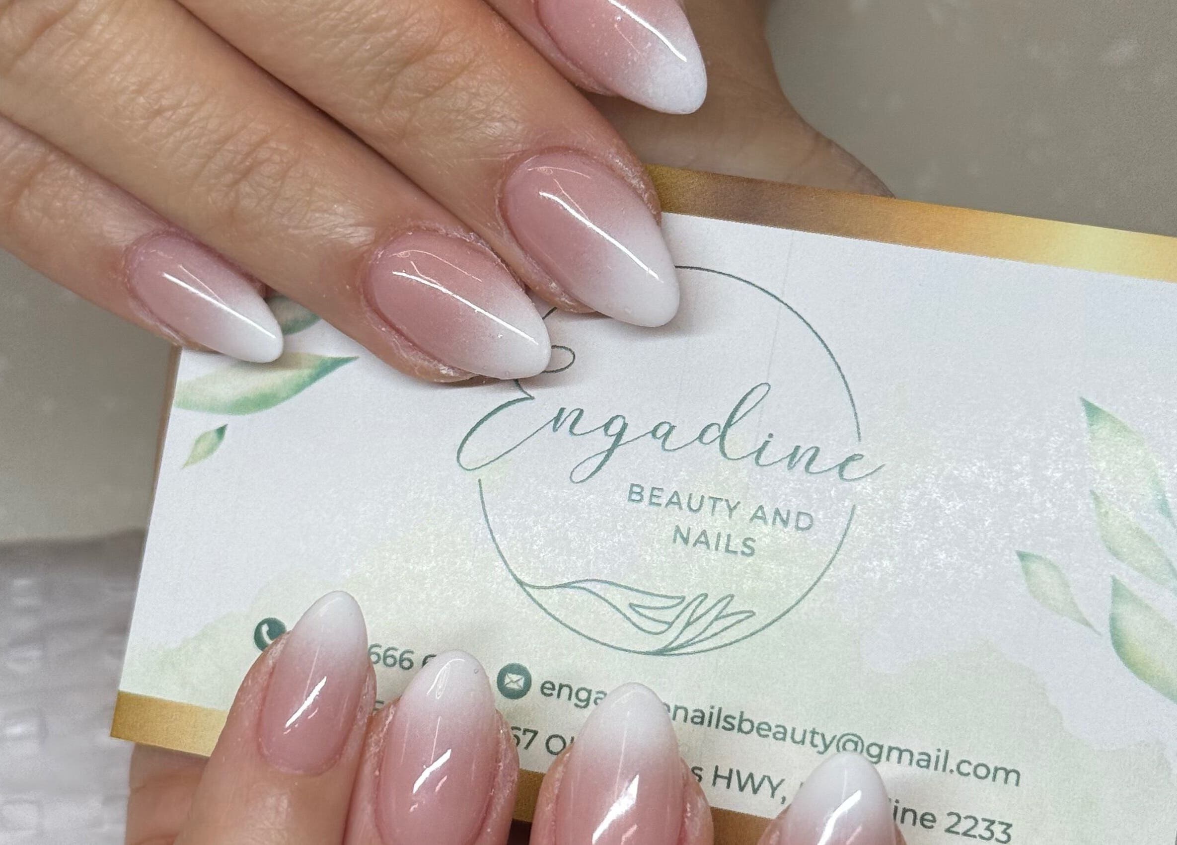 Stylish nails with business card at Engadine Beauty and Nails, Engadine, New South Wales, AU.