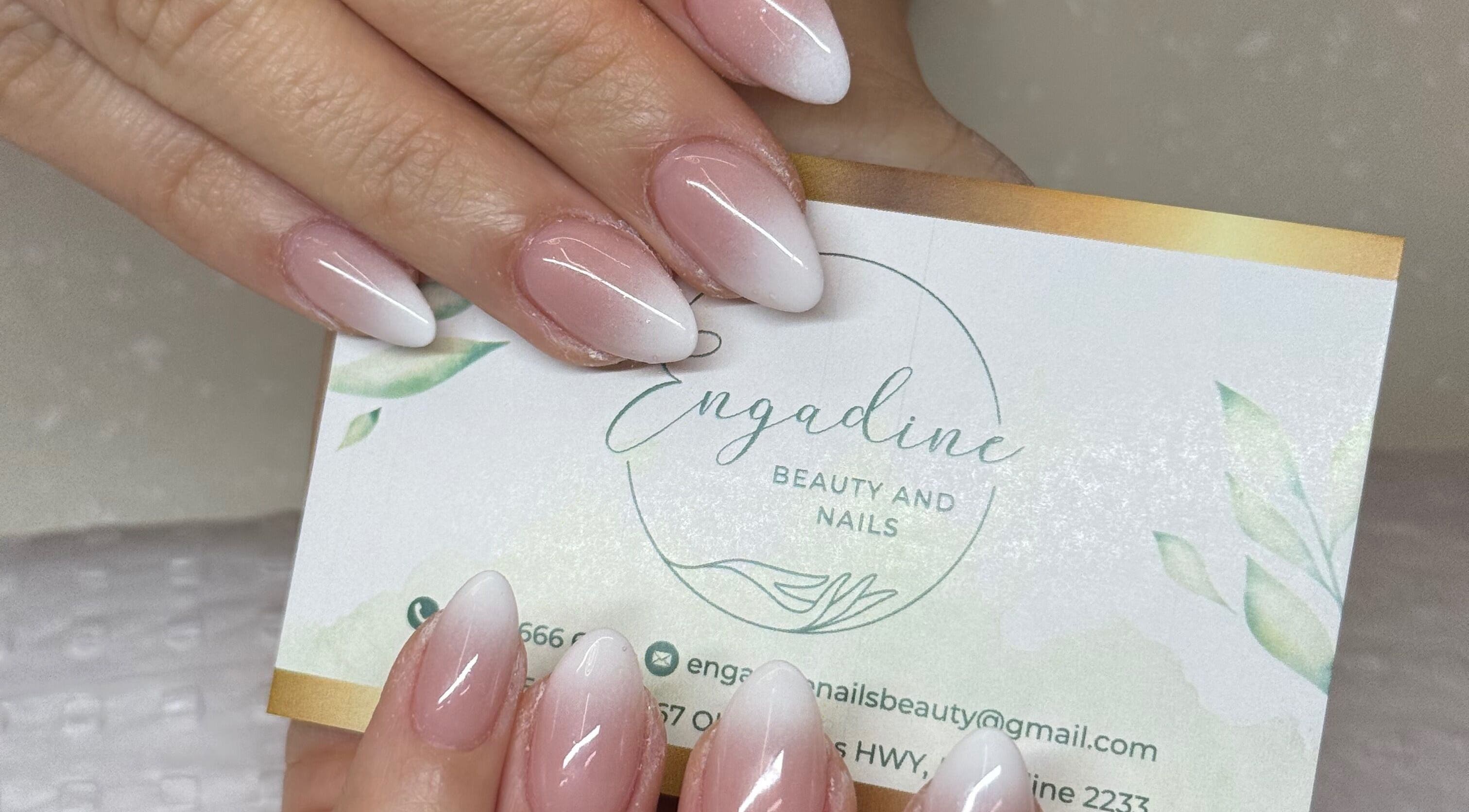 Stylish nails with business card at Engadine Beauty and Nails, Engadine, New South Wales, AU.