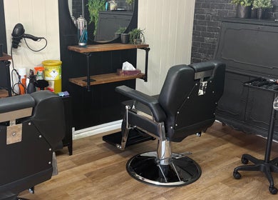 Modern barber chairs and styling tools at Cuts by Amy, Earls Colne, England, GB.