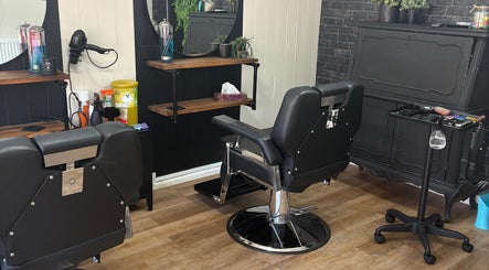Modern barber chairs and styling tools at Cuts by Amy, Earls Colne, England, GB.