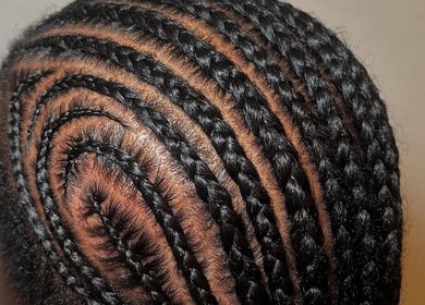 Intricate cornrow braids styled at Hairbyshati, Southampton Parish, Southampton Parish, BM.