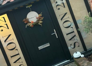 Entrance of Heather Elizabeth Beauty, Bury Saint Edmunds, England, with elegant Salon 22 signage.