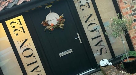 Entrance of Heather Elizabeth Beauty, Bury Saint Edmunds, England, with elegant Salon 22 signage.