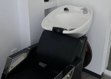 Sleek hair wash station at HEY BEAUTY, Lemesos, Lemesos, CY for ultimate relaxation.