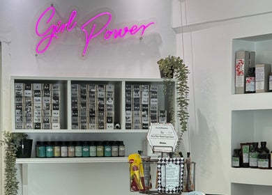 HEY BEAUTY salon product display with neon 'Girl Power' sign, Lemesos, Lemesos, CY.