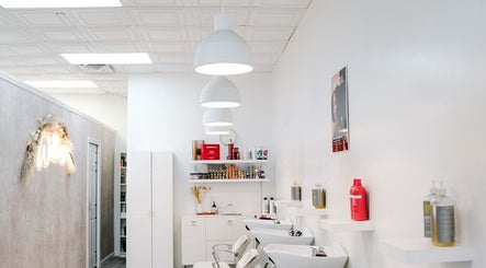 Modern salon interior at Classic Beauty Studio, New York, New York, US featuring chic washing stations and stylish decor.