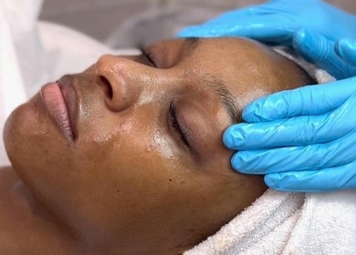 Relaxing facial treatment at Classic Beauty Studio, New York, New York, US, highlighting a serene skincare experience.
