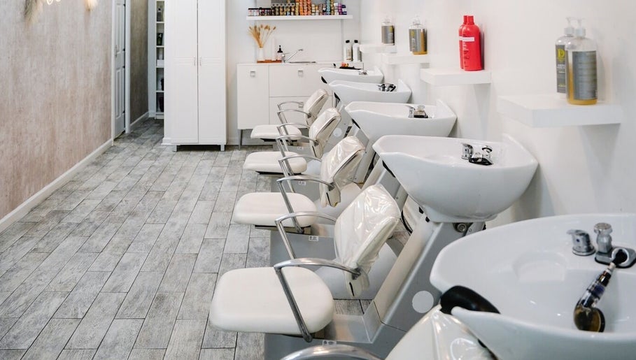 Modern hair wash stations at Classic Beauty Studio, New York, New York, US showcasing sleek and elegant design.