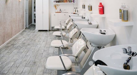 Modern hair wash stations at Classic Beauty Studio, New York, New York, US showcasing sleek and elegant design.