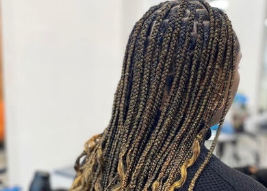 Intricate braided hairstyle at Classic Beauty Studio, New York, New York, US, showcasing expert craftsmanship.