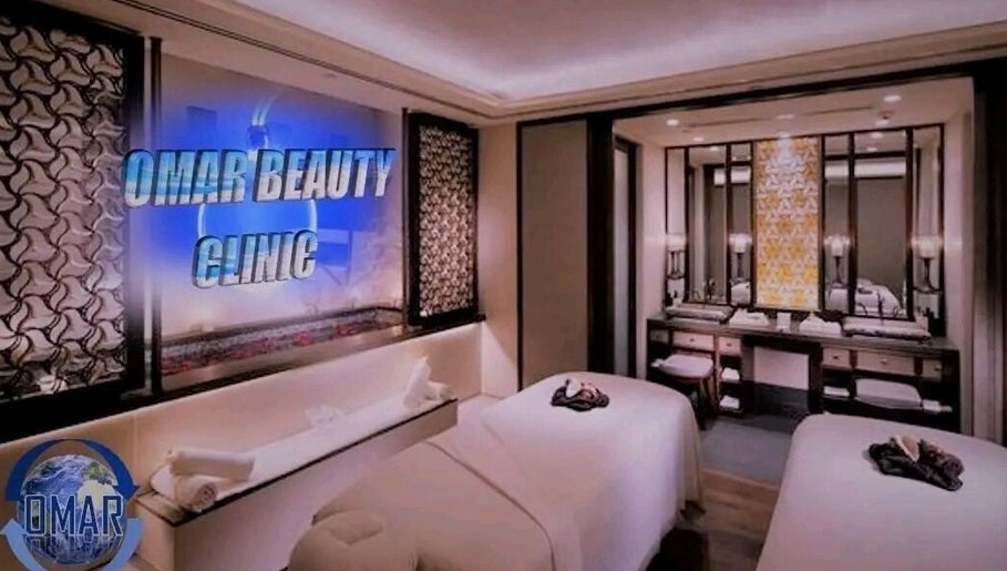 Relaxing massage room at Omar Beauty Spa in Chartwell, Gauteng, ZA with elegant decor and spa beds.