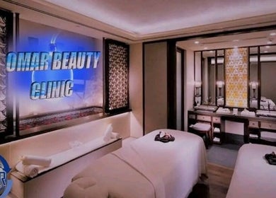 Relaxing massage room at Omar Beauty Spa in Chartwell, Gauteng, ZA with elegant decor and spa beds.