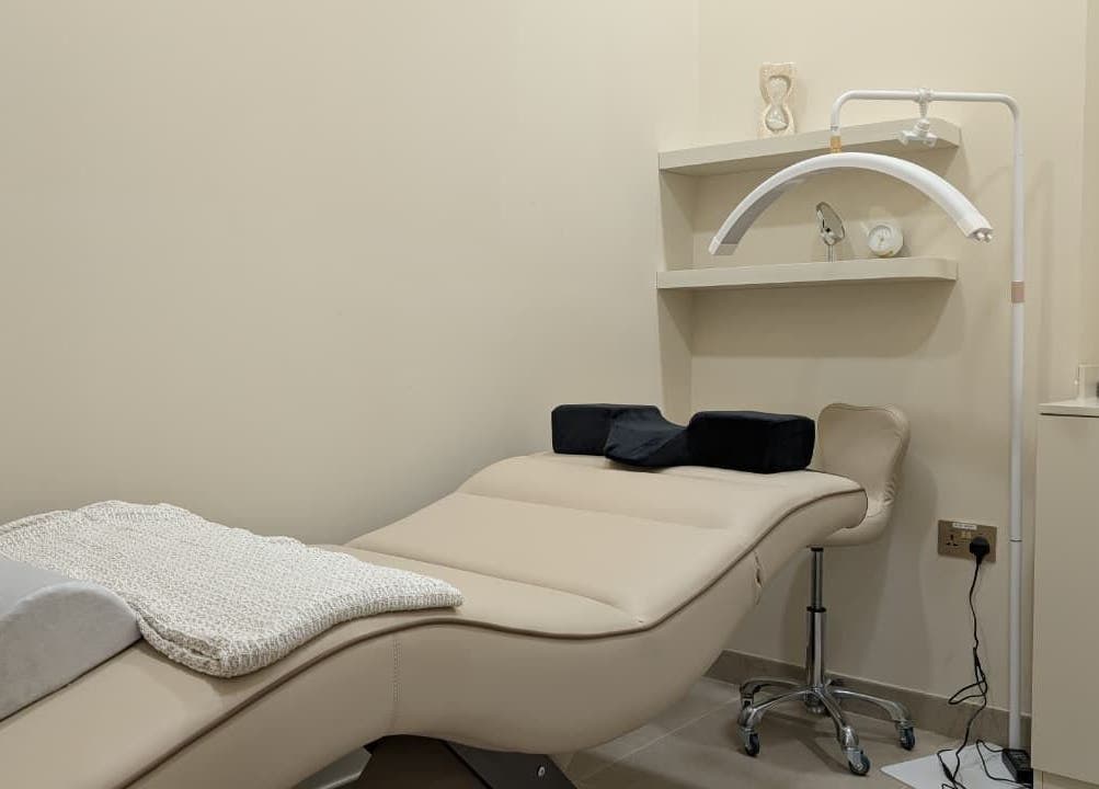 Relaxation room at Sheboss Timeless Beauty Saloon LLC, Dubai, AE with a plush treatment bed and calming decor.