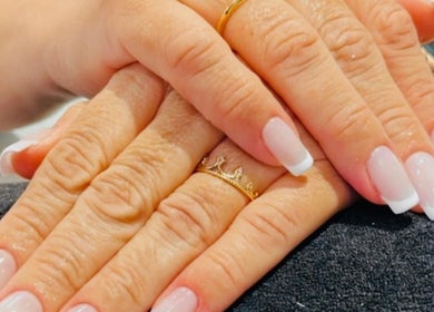 Elegant French manicure at Mari Guimaraes in Dublin, County Dublin, IE, showcasing pristine nail art.