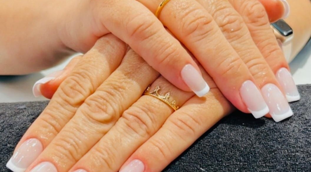 Elegant French manicure at Mari Guimaraes in Dublin, County Dublin, IE, showcasing pristine nail art.
