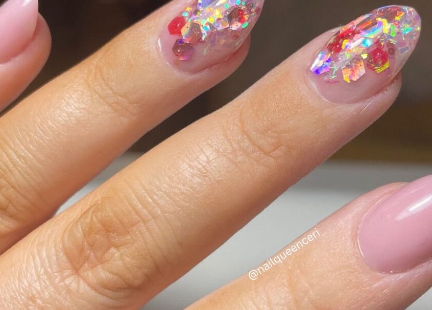 Elegant pink nails with sparkling glitter design at Ceri Elizabeth Nail Queen, Belfast, Northern Ireland, GB.