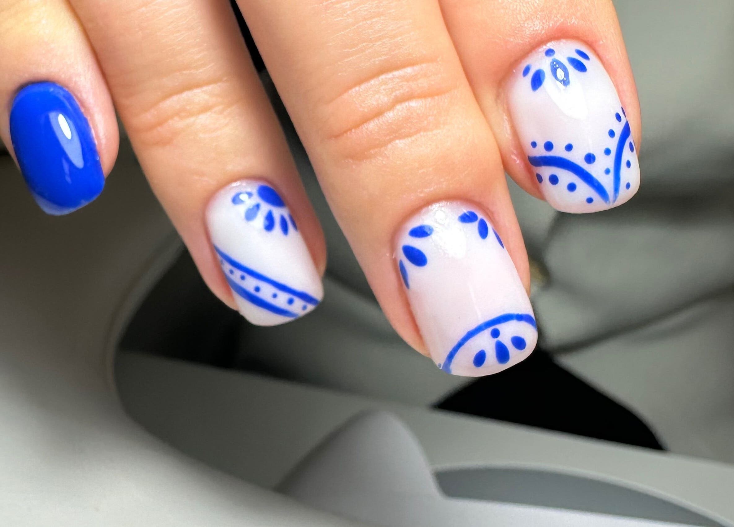 Blue and white nail design at Ceri Elizabeth Nail Queen, Belfast, Northern Ireland, GB.