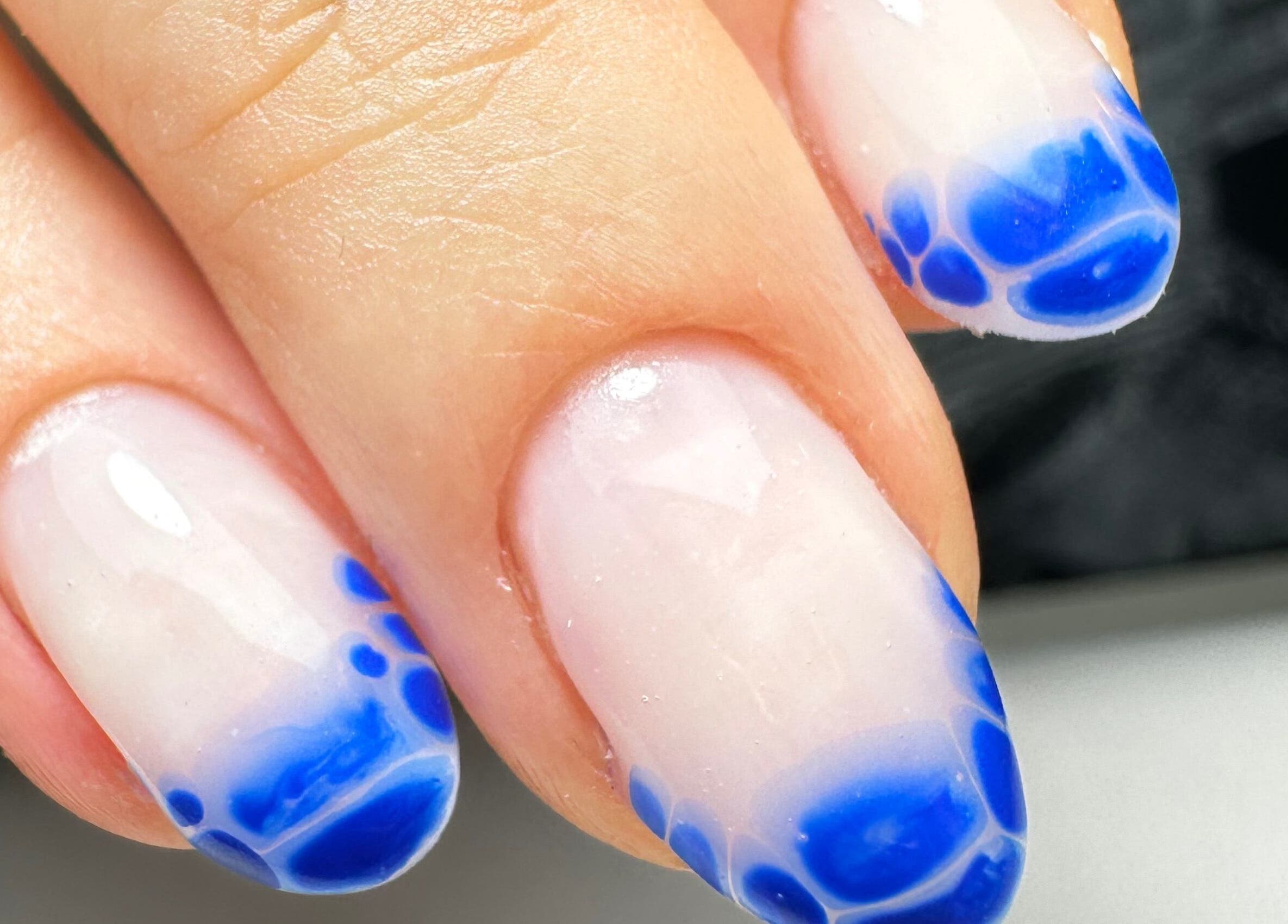 Nail art with blue tips by Ceri Elizabeth Nail Queen in Belfast, Northern Ireland, GB.