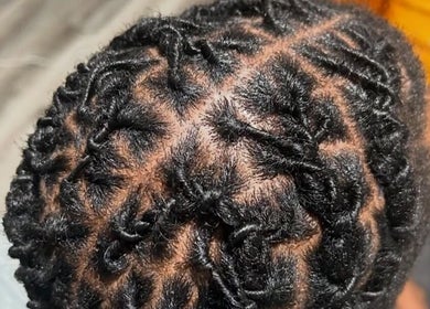 Intricate braid hairstyle at Beestyles0, Savannah, Georgia, US.