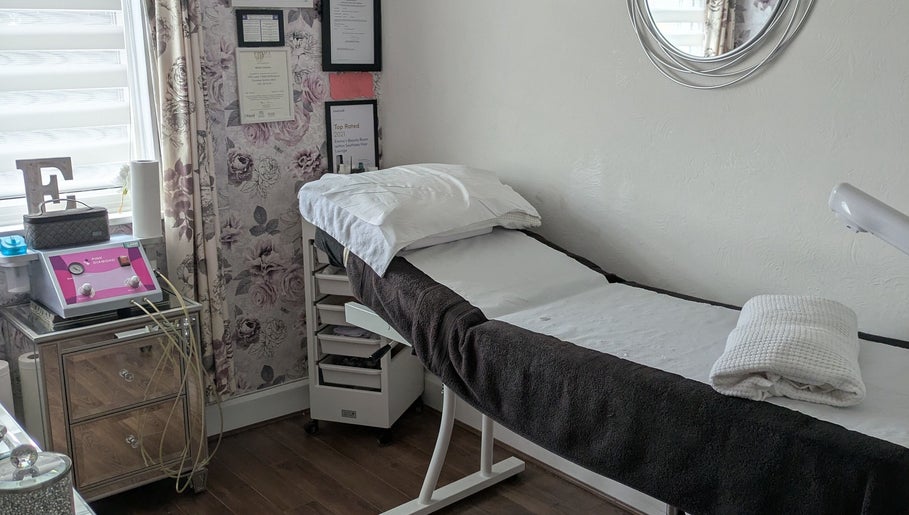 Cozy treatment room at Emma's Beauty Room, Southampton, England, GB. Plush bed and stylish decor for relaxation.