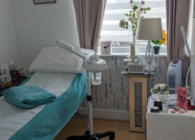Cozy treatment room at Beauty Room in Emma's Beauty Room, Southampton, England, GB, featuring a massage table.