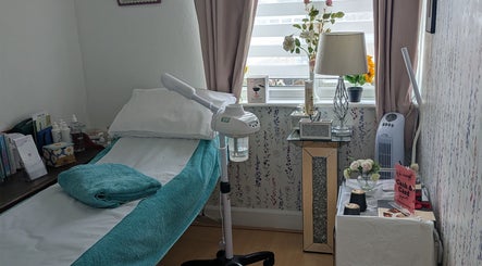 Cozy treatment room at Beauty Room in Emma's Beauty Room, Southampton, England, GB, featuring a massage table.