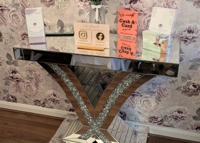 Luxurious mirrored table with floral decor at Beauty Room, Emma's Beauty Room, Southampton, England, GB.