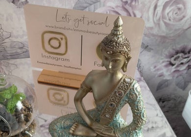 Elegant Buddha statue and social media display at Beauty Room at Emma's Beauty Room, Southampton, England, GB.
