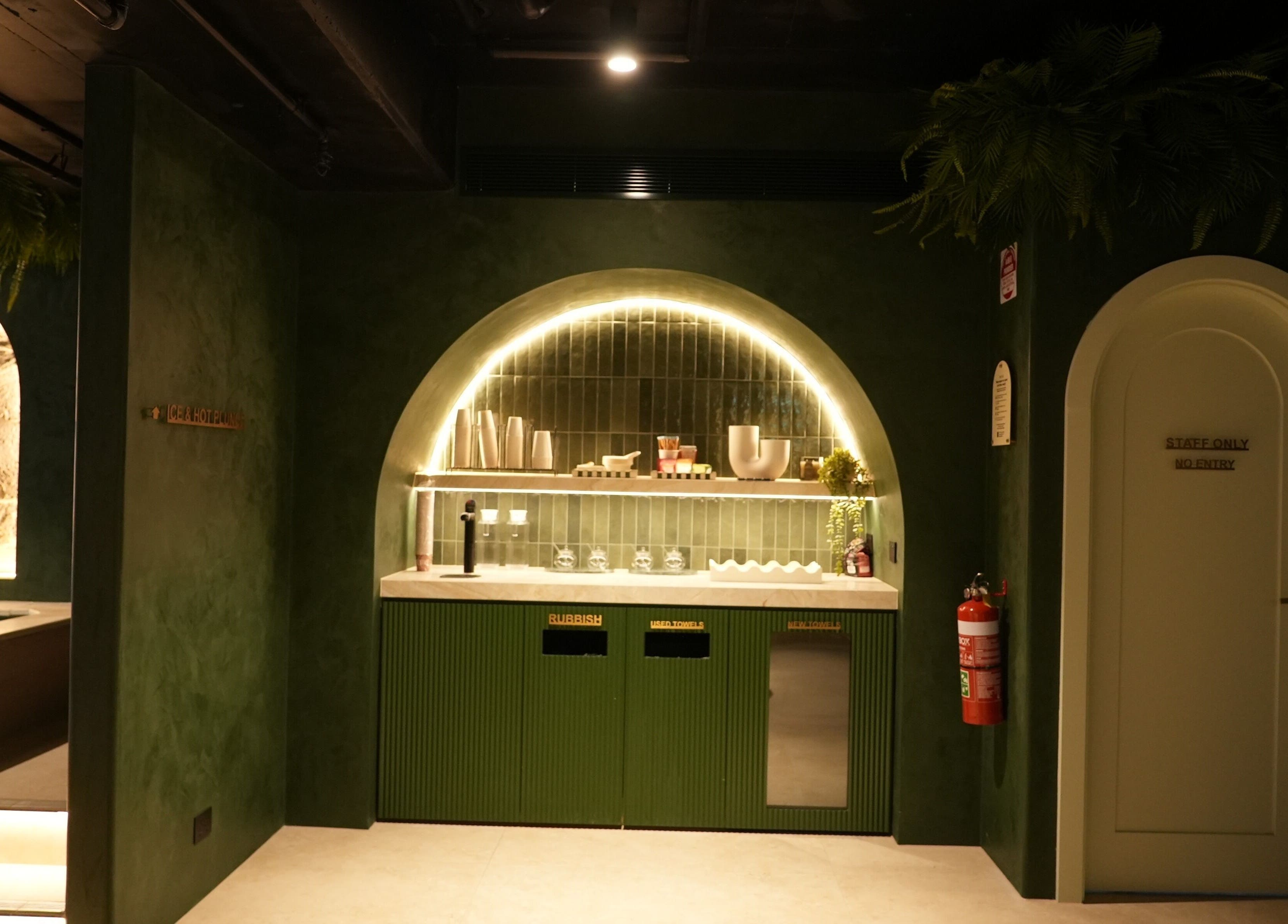 REVIVE WELLNESS GLEBE's tranquil interior featuring an elegant arch and ambient lighting. Glebe, New South Wales, AU.