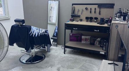 Modern barbershop setup at BobbyCutz, Gabrovo, Gabrovo, BG featuring a stylist chair and tools.
