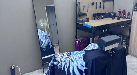 Modern barber station at BobbyCutz, Gabrovo, Gabrovo, BG featuring a stylish chair and organized grooming tools.