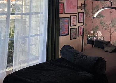 Cozy treatment room at The Luxe Lash Studio, Dana Point, California, US with modern decor and soft lighting.