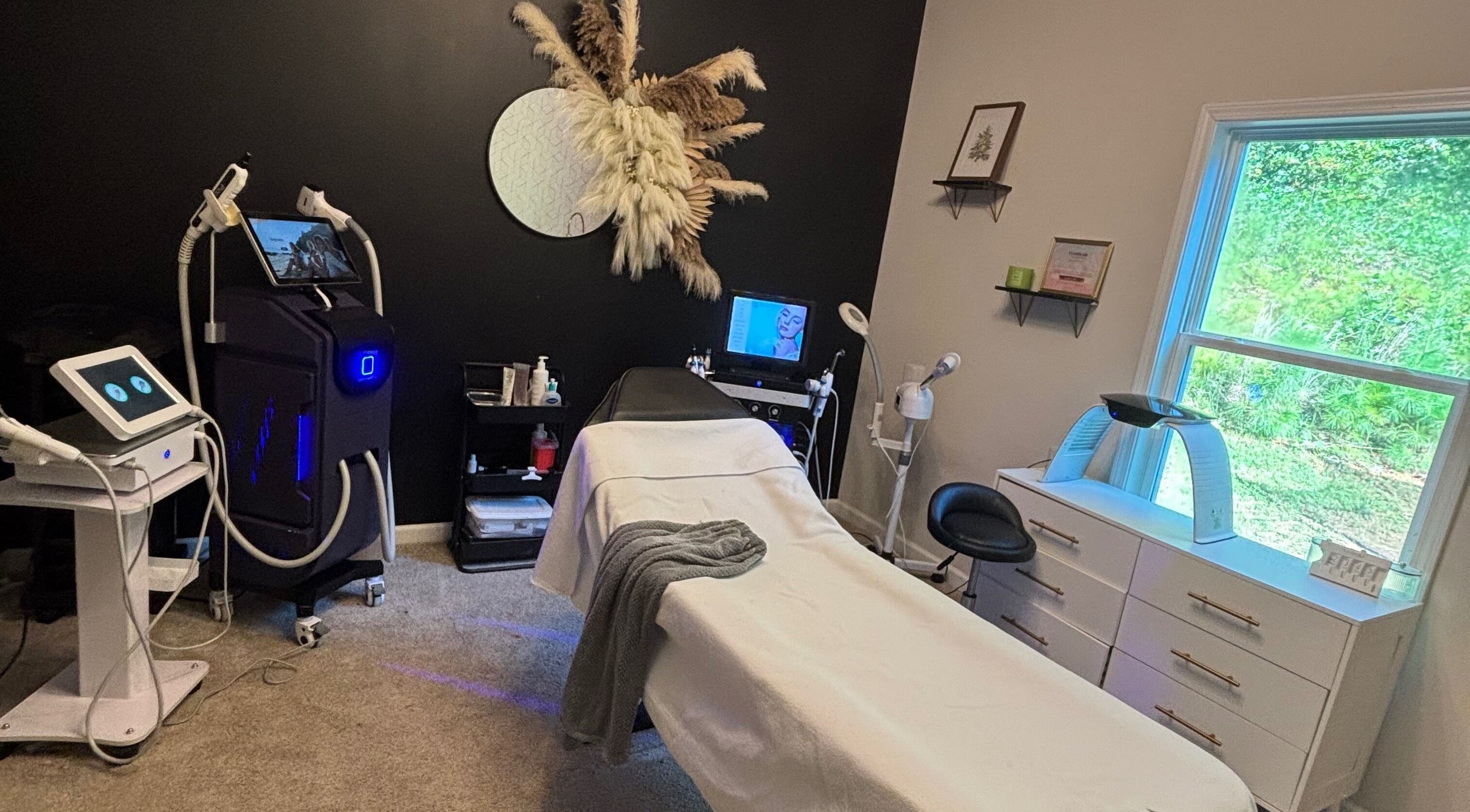 Elegant treatment room at Hola Skin & Beauty in Temple, Georgia, US, featuring modern equipment and soothing decor.