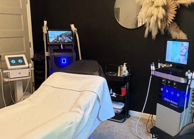 Relaxing treatment room at Hola Skin & Beauty in Temple, Georgia, US with modern skincare equipment.