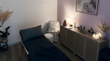 Cozy massage room at Chasing Better 247 Massage, Malaga, Western Australia, AU featuring ambient decor and candles.