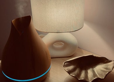 Tranquil setting at Chasing Better 247 Massage, Malaga, Western Australia, AU with lamp and diffuser.