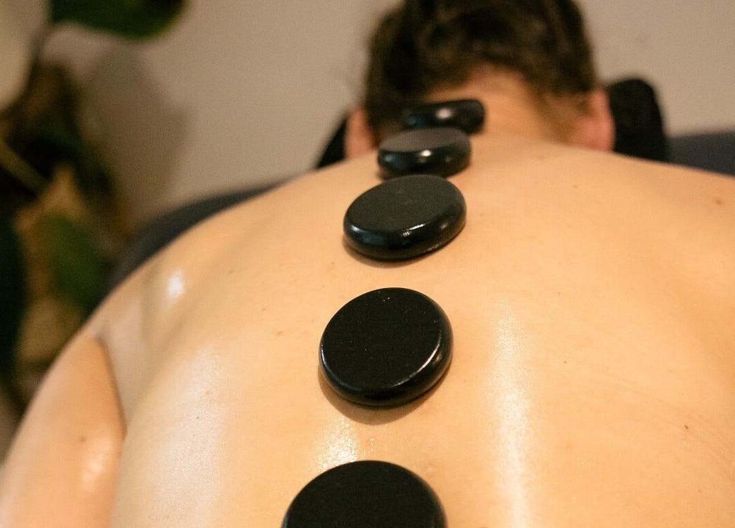 Hot stone therapy at ChasingBetter247 Massage, Malaga, Western Australia, AU for ultimate relaxation.