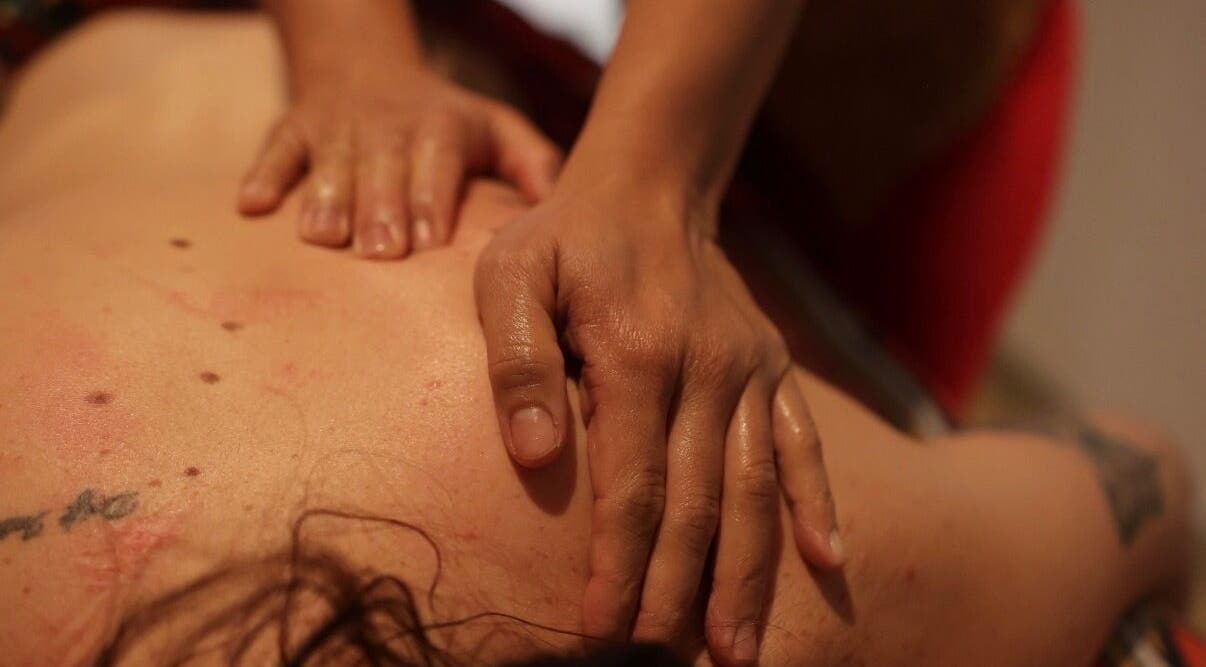 Hands massaging a back at ChasingBetter247 Massage, Malaga, Western Australia, AU.