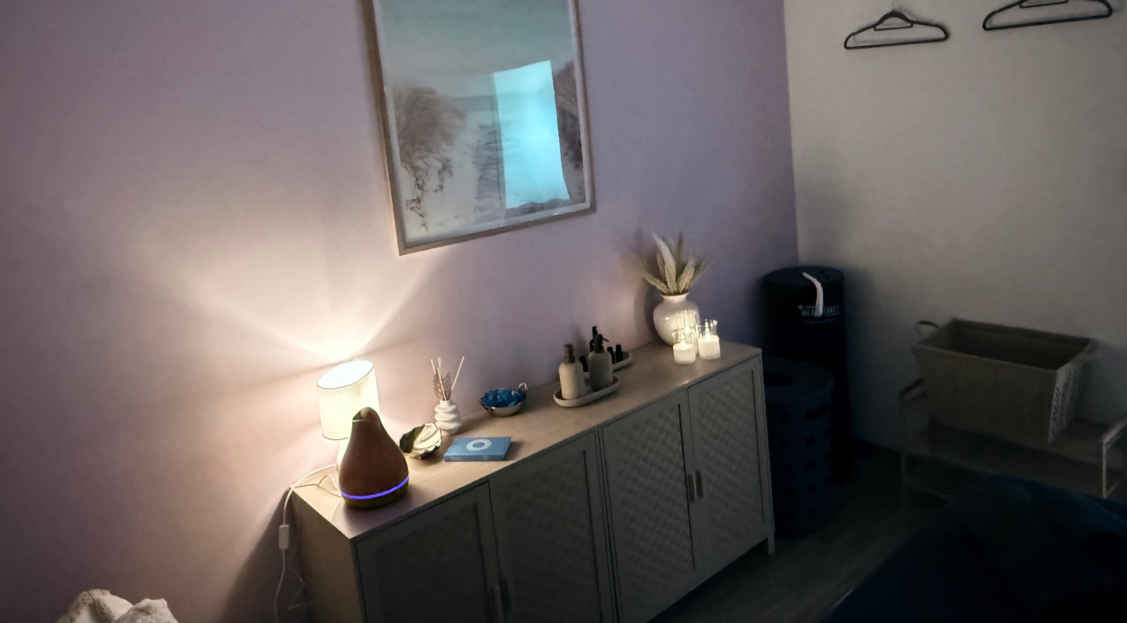 Cozy massage room at ChasingBetter247 Massage, Malaga, Western Australia, AU with soft lighting and decor.