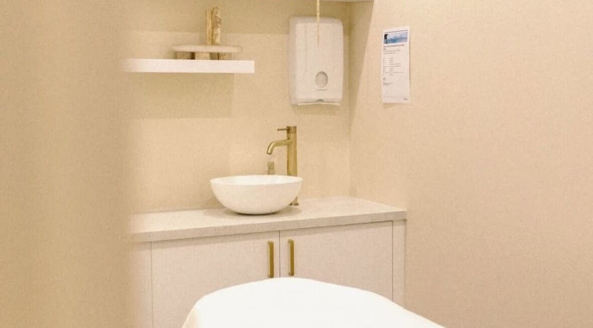 Elegant spa room at Evon Lush Aesthetics, Toowong, Queensland, AU with tranquil beige tones.