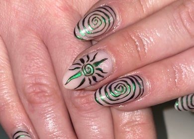 Stylish spiral nail art at Gel by Jade, Woodend, Canterbury Region, NZ, showcasing creative designs.
