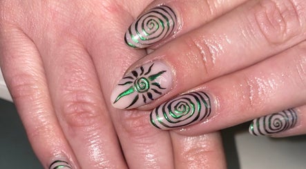 Stylish spiral nail art at Gel by Jade, Woodend, Canterbury Region, NZ, showcasing creative designs.