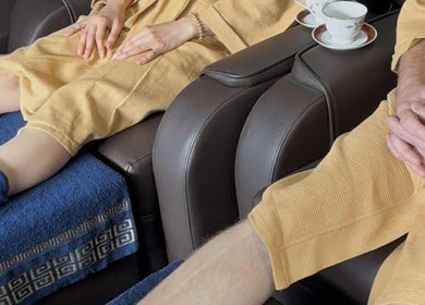 Guests in robes enjoy a foot spa at Silk Spa Balaclava - Head Spa & Body Health & Natural Beauty, Melbourne, Victoria, AU.