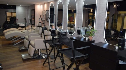 Chic salon interior at Hair by Chelsey - Studio 89 in Bournemouth, England, GB, featuring sleek mirrors and chairs.