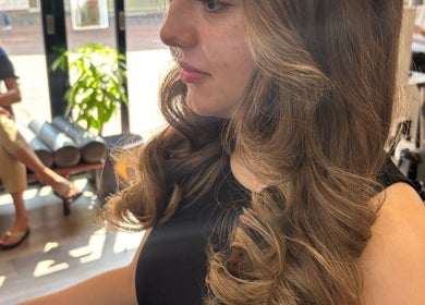 A beautifully styled curly hair at Chelseys Hair - at Oh so silk Blandford, Blandford Forum, England, GB.