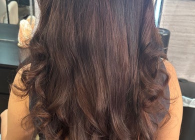 Lustrous curls styled at Chelseys Hair - at Oh so silk Blandford, Blandford Forum, England, GB.